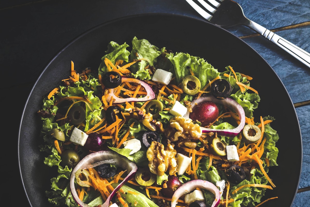 Colorful Greek salad with feta cheese and olives